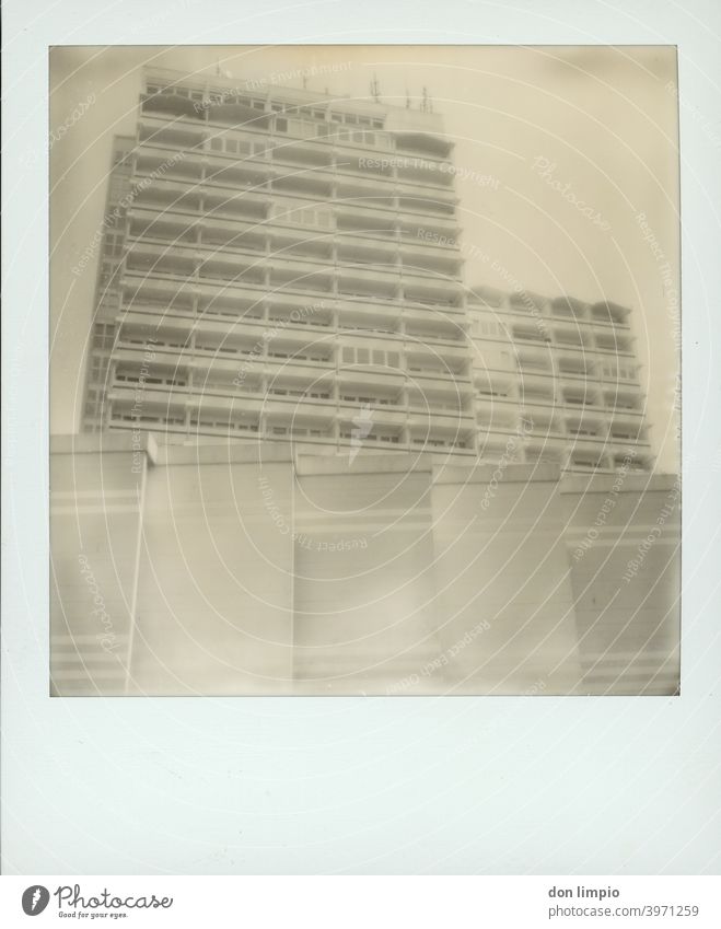 skyscraper High-rise, Sharp-edged Polaroid Structures and shapes Architecture Corner Wall (building) Deserted Facade Balconies Monochrome monotonously Tall holm