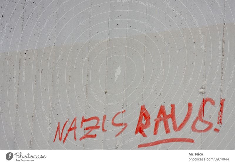 but now quickly I nazis out ! Characters Wall (barrier) Wall (building) Graffiti Politics and state Gray Protest Subculture Resolve Frustration Revolt Anger