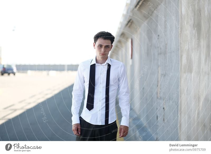 Young Handsome Male Model with Curly Hair and tie outside male Fashion Man teenager young Young man young adult Youth (Young adults) Curly hair brown hair