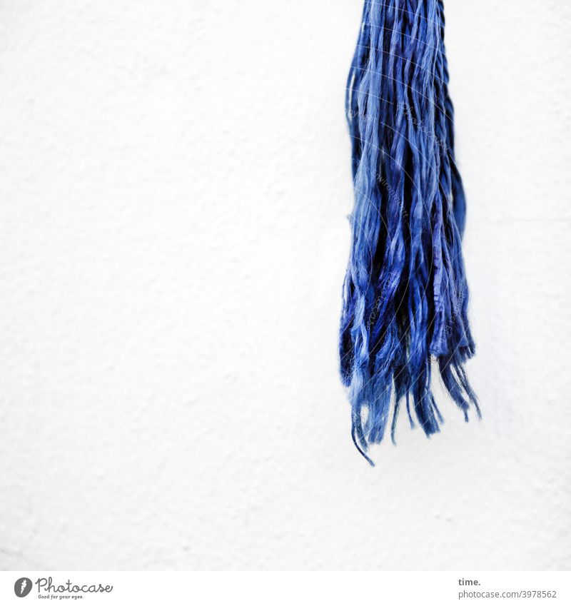 End of a cord Fringe fringed Rope yarn Hang Blue Wall (building) threads Tattered twine twined Multi-ply Cotton plant Plastic