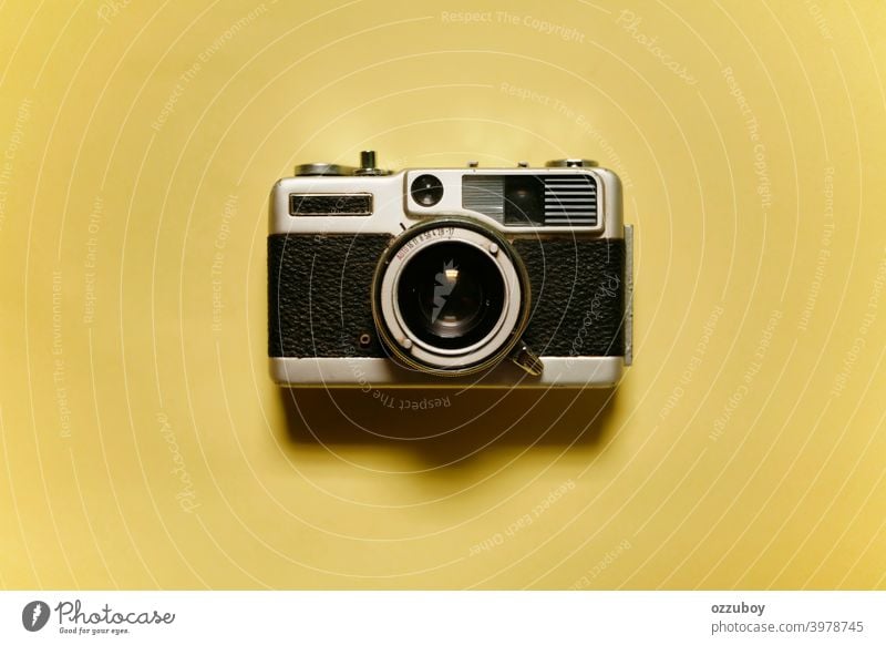 Analog Old Retro Camera With Celluloid Film Isolated On White