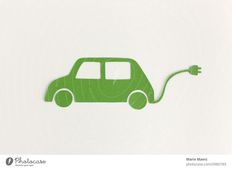 E-car | paper illustration of green car with power cable e-car Symbols and metaphors Mobility Future Means of transport Vehicle Electricity Technology