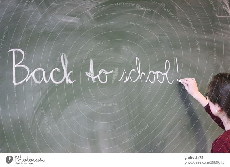 Back to school - Young teacher writes with chalk on the blackboard School Lessons back to school Classroom teaching Chalk Blackboard Teacher 18-25 years Day