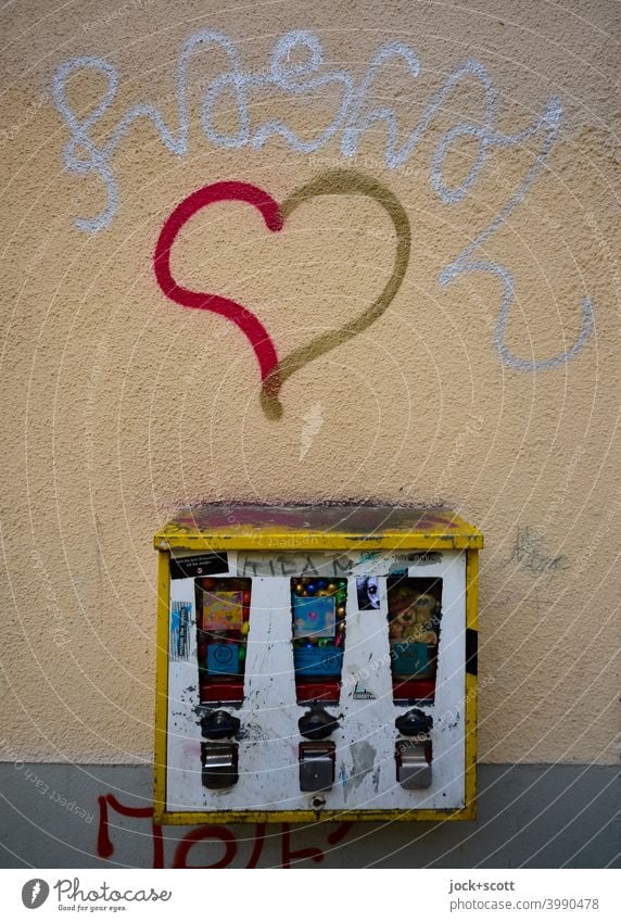 Love for neglected gumball machine Gumball machine Design Change Abrasion Ravages of time Weathered Street art Heart (symbol) Scrape Creativity Dirty Graffiti