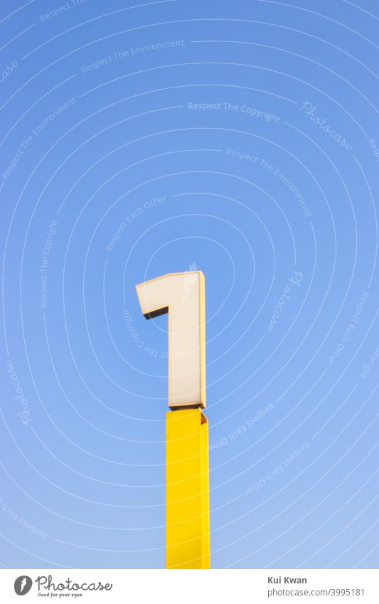 Number 1 ; number one sign in yellow ; with plain blue sky Numbers Number one Digits and numbers Characters Minimalistic minimalism 123 one and only Mathematics