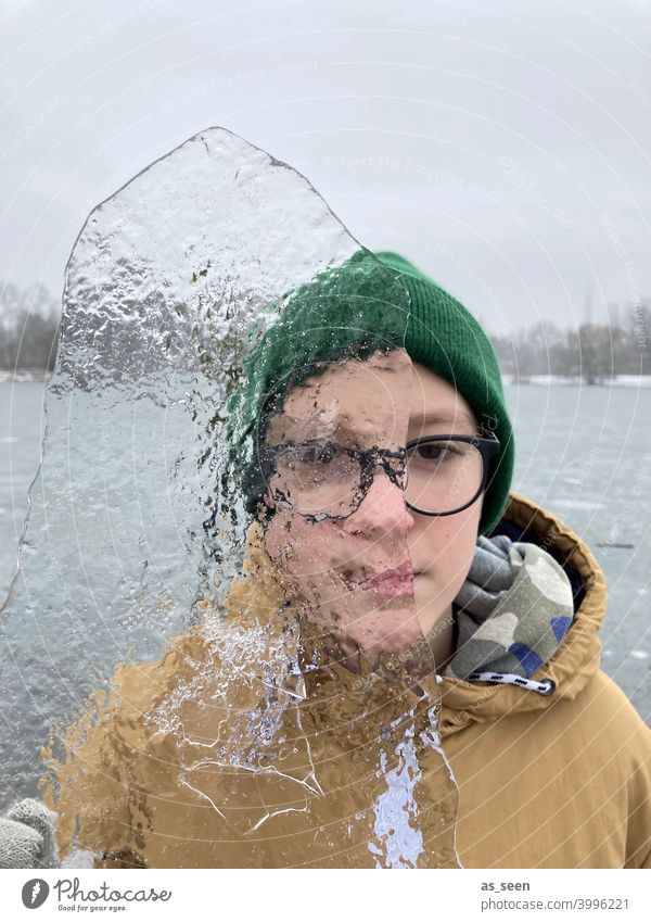transparency Boy (child) Ice Transparent Cold Winter Frost Frozen Snow Freeze Ice crystal Crystal structure Nature Water Cap Lake glove Infancy Exterior shot