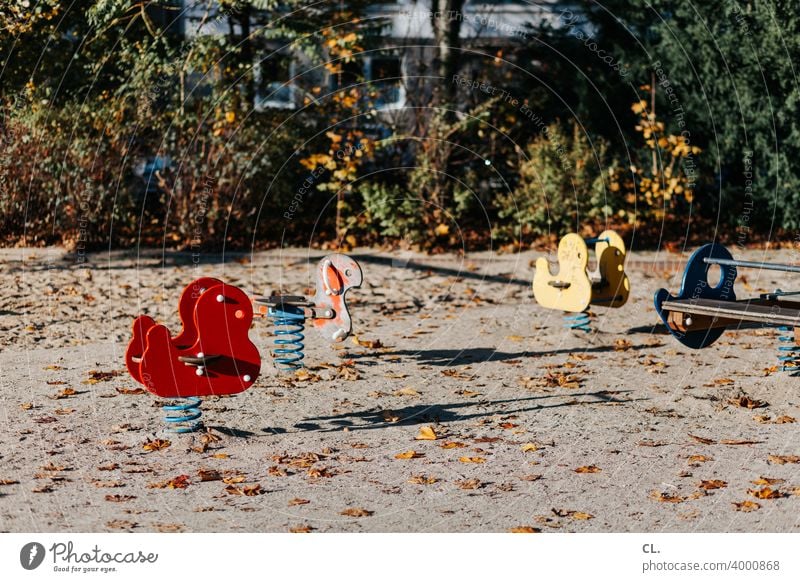 empty playground Playground Infancy Empty Playing Spring rocker Seesaw Autumn Toys Deserted