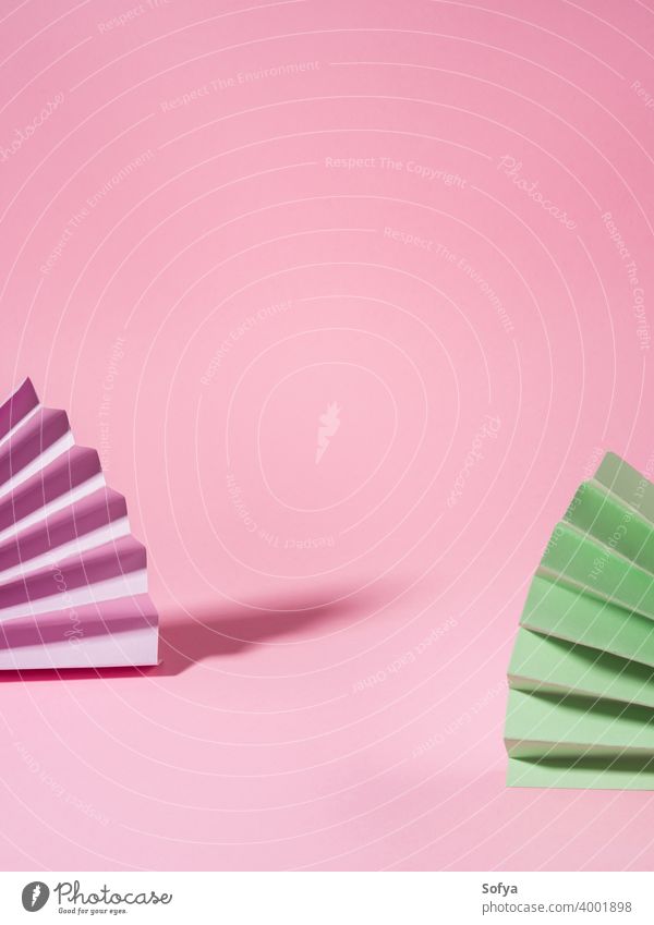 Geometrical pink background with paper colorful fans beauty display mock up showcase chinese invitation design shadow geometry paper fan greeting card product