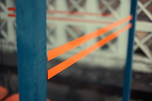 Lines on the window panes of a bus stop Orange Blue Stop (public transport) Public transit Colour photo Deserted Transport Exterior shot Passenger traffic