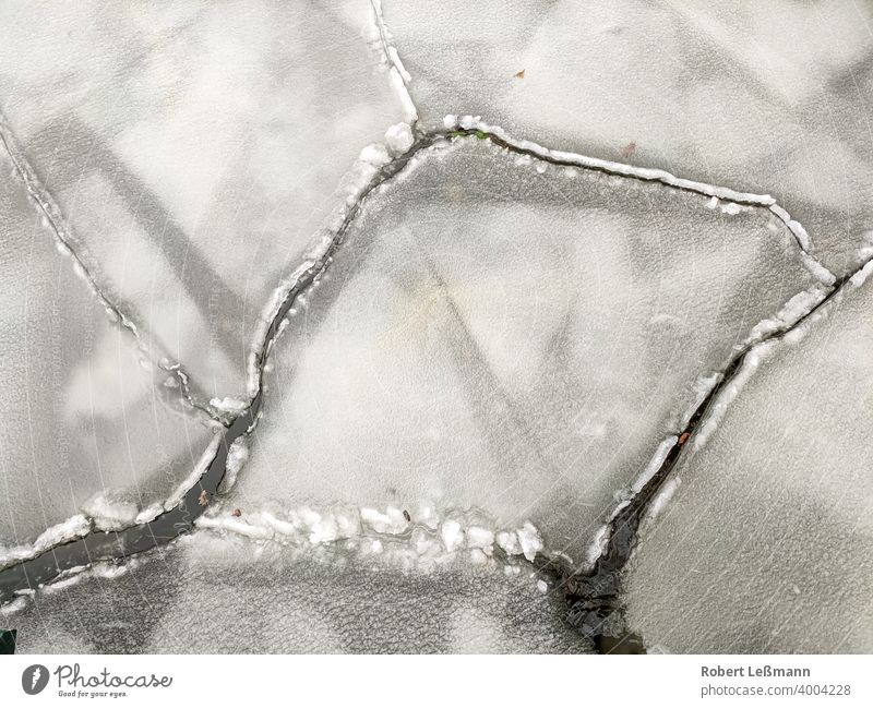 Close-up of ice floes on a lake, at freezing temperatures Frozen Lake Ocean Frost Slice Ice Plaice quick-frozen ice crystals background icily Abstract Winter