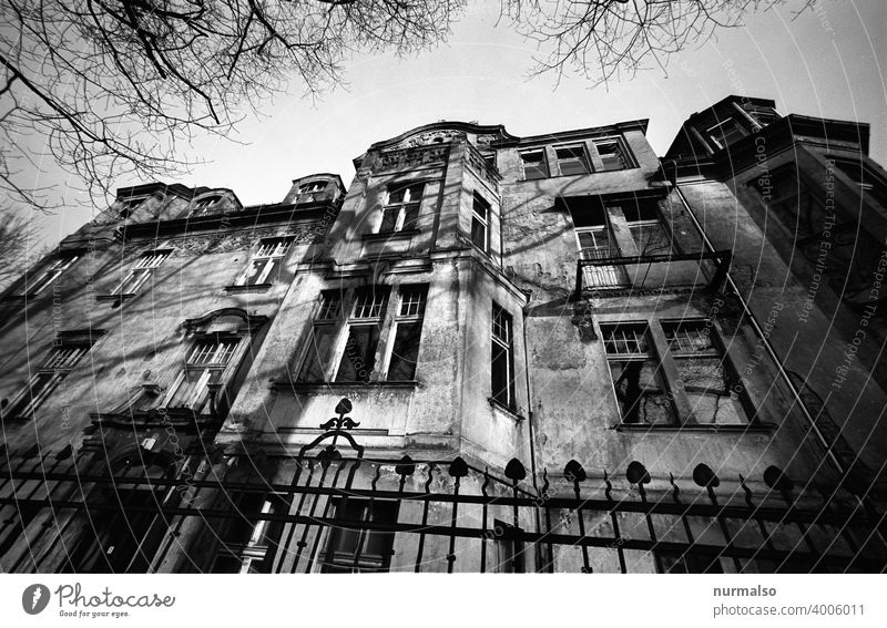 old town House (Residential Structure) unrefurbished Analog black and white Wide angle Facade apartment building Art nouveau taun Wrought iron Weathered