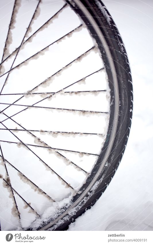 Front wheel in snow Snow Virgin snow Snowfall Winter winter holidays Wheel Bicycle Spokes Wheel rim winter tyres handicap smooth peril Dangerous