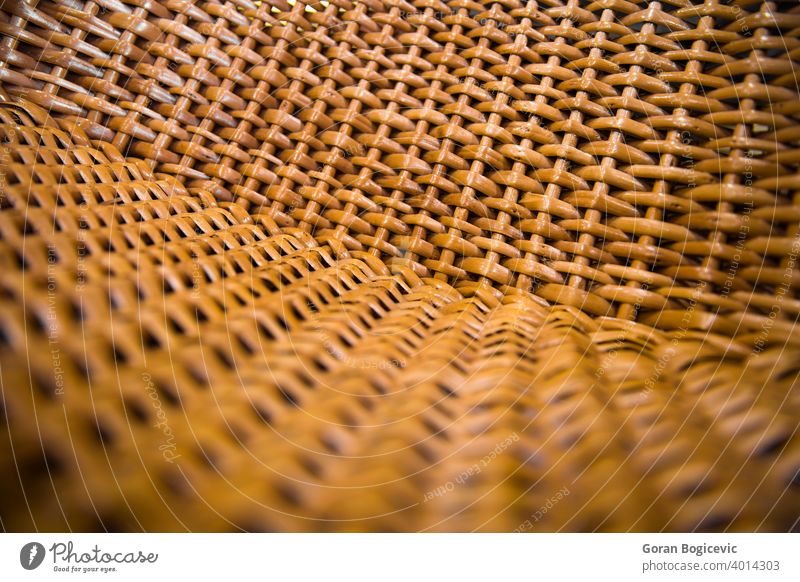 Closeup detail of the wicker chair pattern design material closeup textured mesh surface background rattan wood handmade fiber nature structure rough woven
