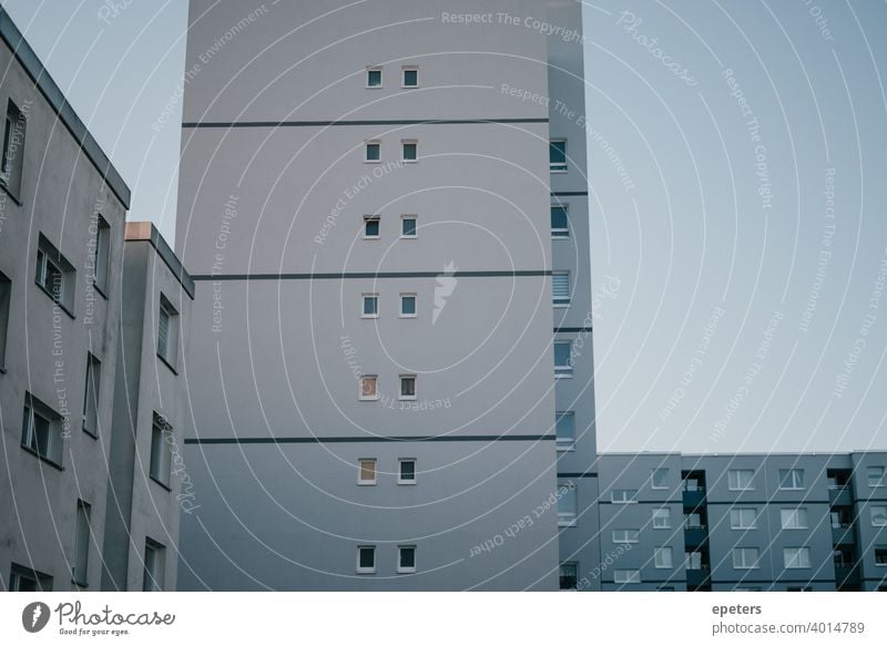 Grey blue house wall of a prefabricated building in Hamburg Steilshoop Prefab construction Panel construction Blue Gray ultimate grey Shadow Window