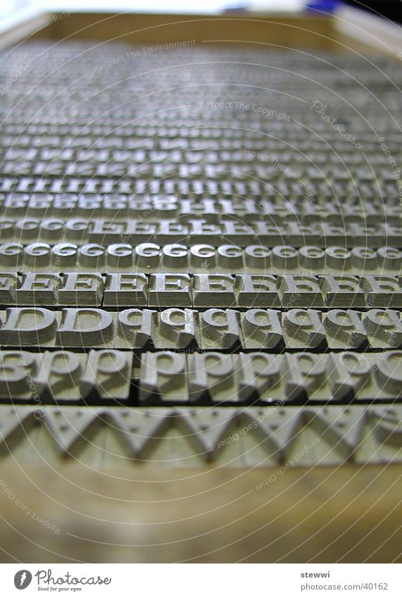 letters Typography Hot metal type Typesetter Letters (alphabet) Lead Media Newspaper Printing Sit Print shop Typecase Capital letter Craft (trade) Arrangement