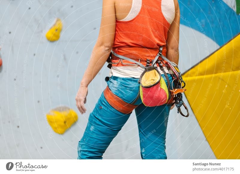 Rock climbers on a rock wall closeup. Climbing gear and equipment. Black  and white. Stock Photo