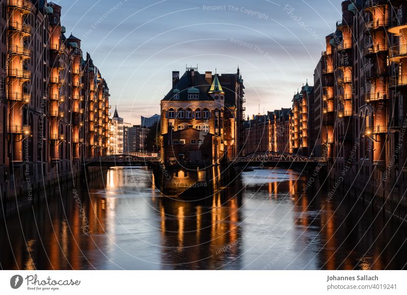 Water castle at the blue hour Hamburg Moated castle Poggen mill bridge storehouse city Harbour Moody clearer Deserted Architecture architectural photography