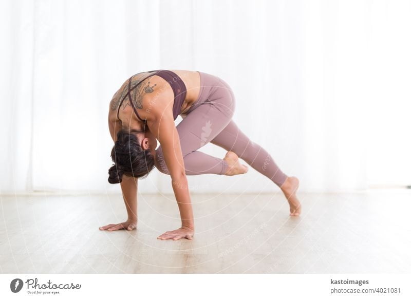 Yoga Girl. Beautiful Woman doing Yoga Exercises Stock Photo