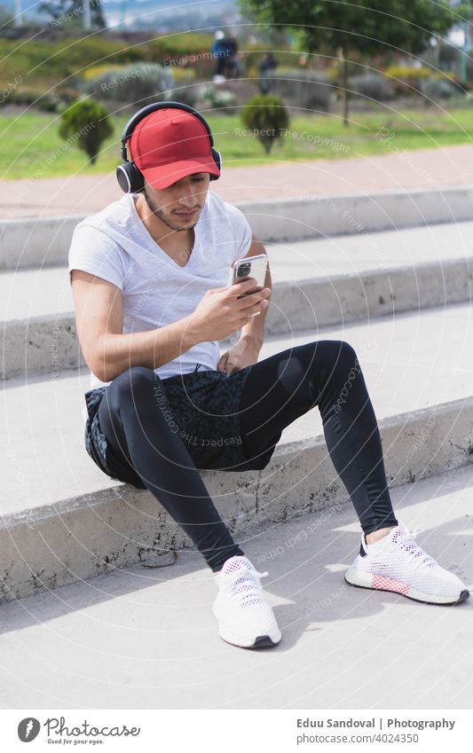 Young man listening to music for exercise. physical exercise sport smile young caucasian training female fitness smiling woman healthy athlete earphones happy