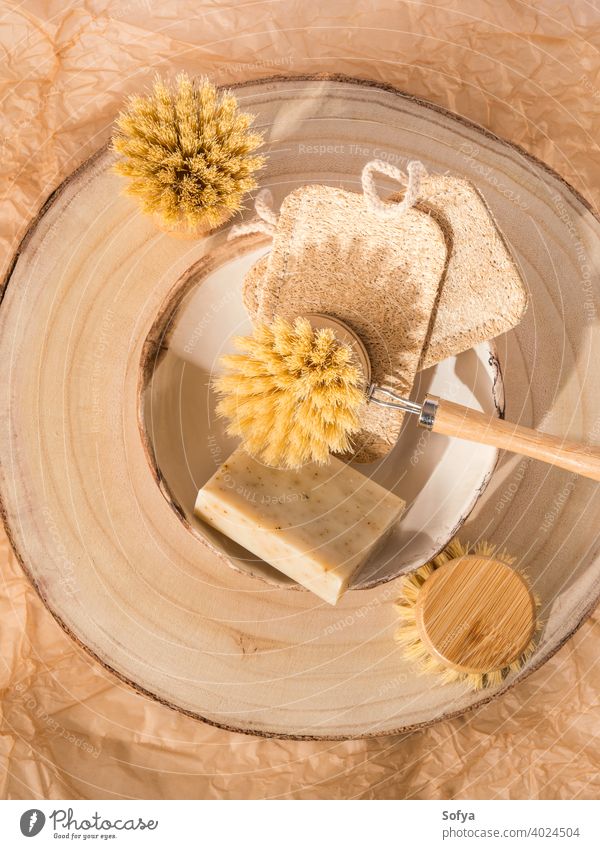 Stack kitchen sponges on yellow table background. Cleaning sponge