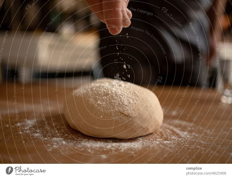 A dough is kneaded on a kitchen table and dusted with flour Dough pizza dough Kitchen Kitchen Table Flour Self-made Baking Bakery Baked goods Bread bread dough