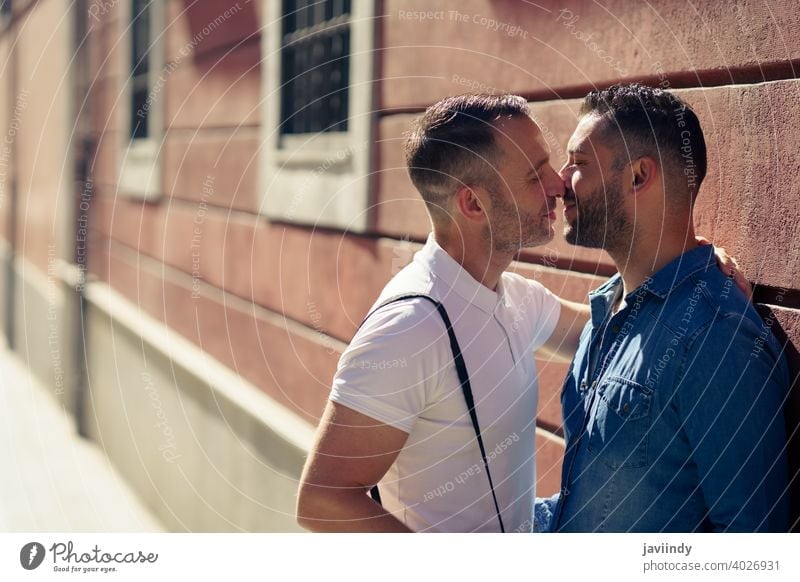 Gay Couple Kissing Outdoors In Urban Background A Royalty Free Stock