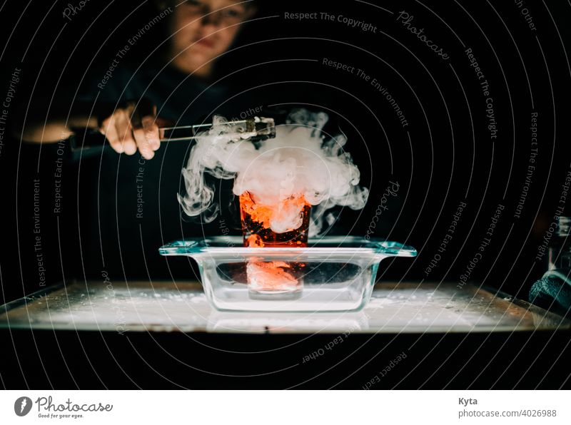 A young student experiments with dry ice experimenting Experimental Science & Research science Science museum Steam Smoke Smoke cloud Explosion homeschooling