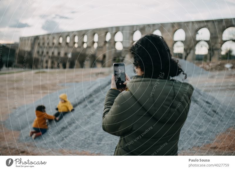 Mother photographing childs playing motherhood Authentic Child childhood Family & Relations Photography Infancy people Together Parents care Lifestyle Caucasian