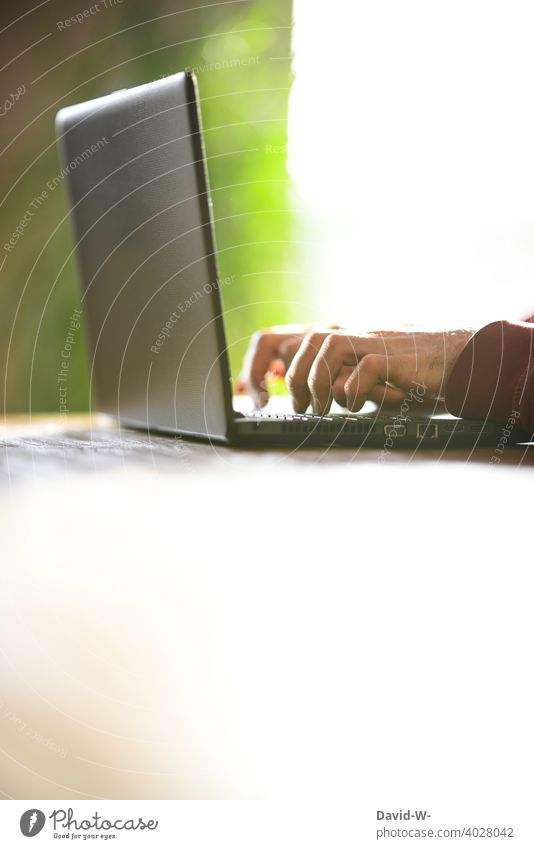 Man sitting at the laptop and typing on the keyboard Notebook Computer Technology University & College student Typing Lifestyle labour mobile Online Internet