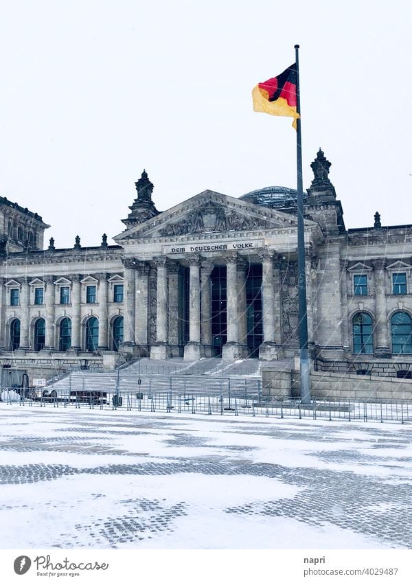 he VOLK los | Reichstag building Berlin in winter with snow, without people Germany German flag Bundestag Deserted Government cordoned off safeguarded