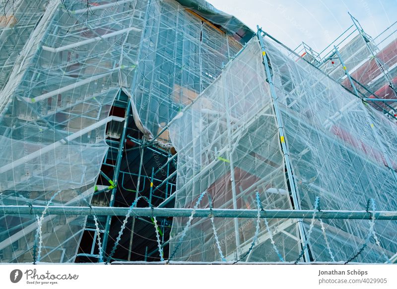 Scaffolding at church for the renovation of the facade Collateralization Architecture Construction site Site safety Theft Facade Building Believe God Church