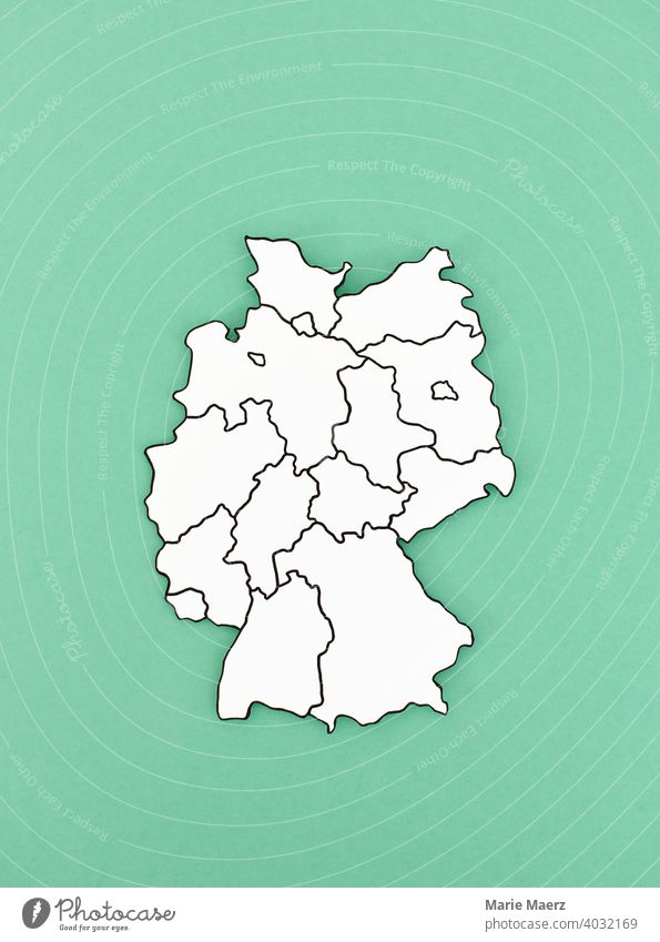 Paper map of Germany with federal states marked on it States Map frontiers Abstract Minimalistic Neutral Background country paper cut Illustration outline