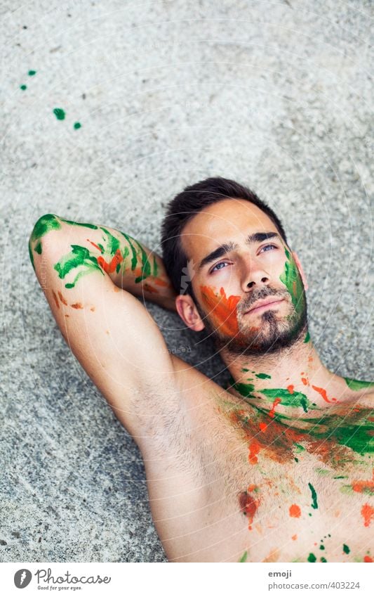 green-orange Masculine Young man Youth (Young adults) Body 1 Human being 18 - 30 years Adults Uniqueness Bodypainting Lie Colour photo Exterior shot