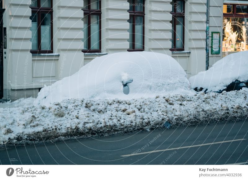 car completely covered in snow auto automobile blizzard city climate cold commute conditions dirt freeze frost frozen ice icy nature outdoor outdoors parked