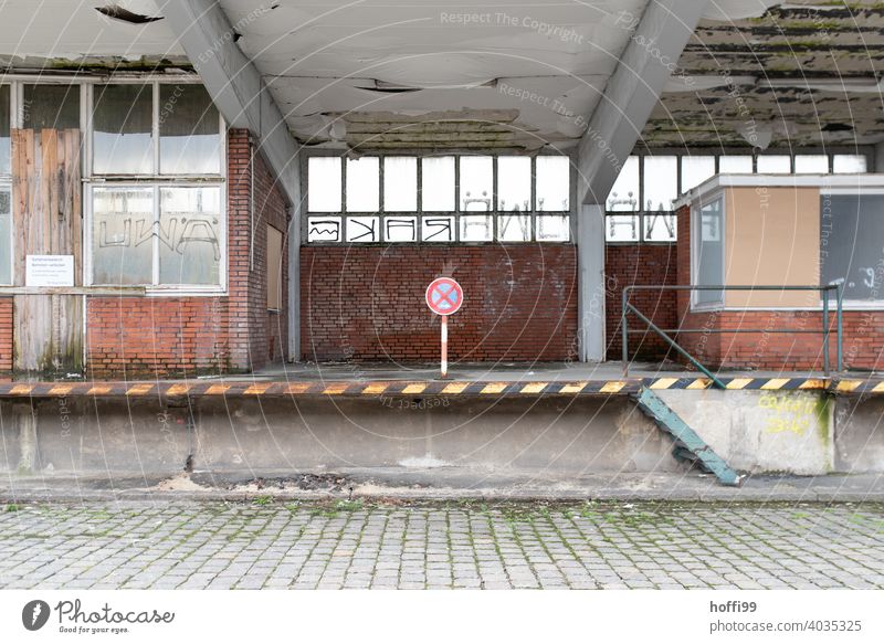 abandoned loading ramp - absolute stopping ban Ramp loading bay Loading station Customs station customs office no stopping sign absolute ban on holding