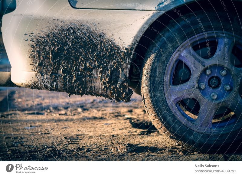 dirt on white car, dirty gravel roads because of spring thaw dirty car car wash abstract asphalt auto automobile background black blue chrome clean close