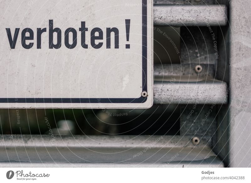 Sign with the inscription 'Forbidden!' on a metal gate |Trespassing is...unhealthy Bans Prohibition sign Signs and labeling Deserted Colour photo Warning sign