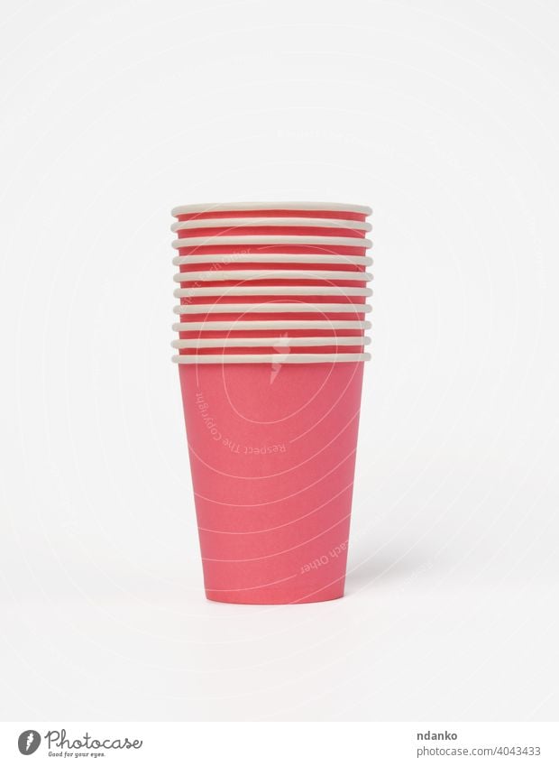 pink paper disposable cups on a white background, concept eco-friendly dishware drink empty fast food hot liquid mug nobody package party portable recycling