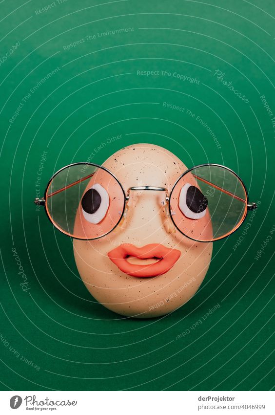 Easter egg with pink glasses and eyes and mouth made of plasticine Easter eggs Easter Monday Easter gift Easter wish Easter weather Egg Decoration