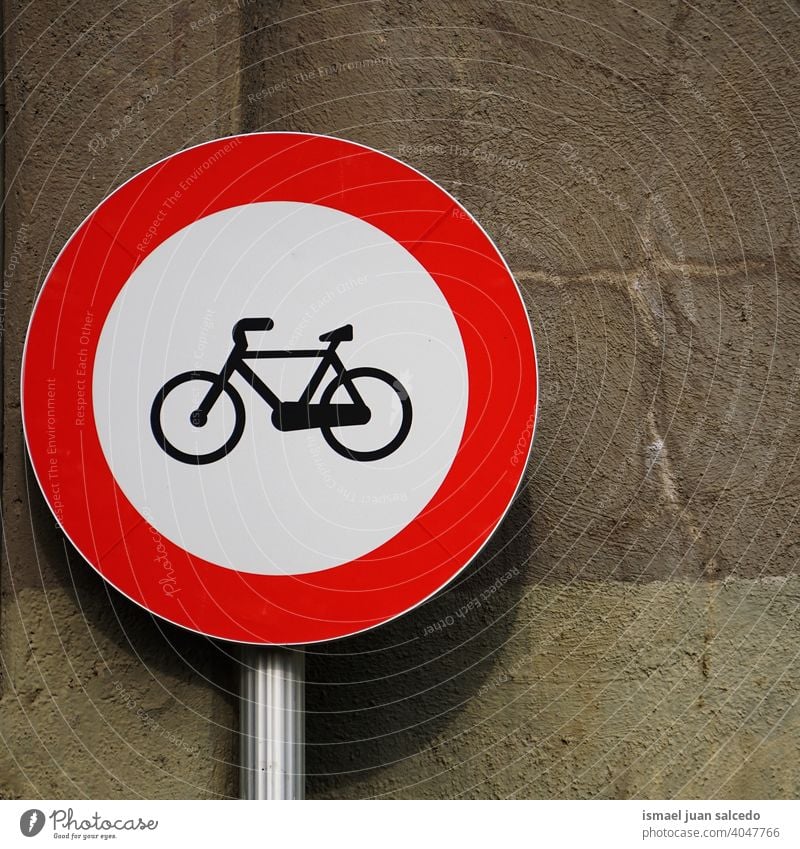 bicycle traffic signal on the wall bike bicycle signal road warning street city road sign symbol way caution roadsign advice safety outdoors bilbao spain circle