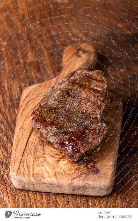 grilled steak on wood beef steak Grilled Steak vintage medium Pepper Beef Chopping board Gourmet Above Sirloin Barbecue (apparatus) sirloin Meat Wood background