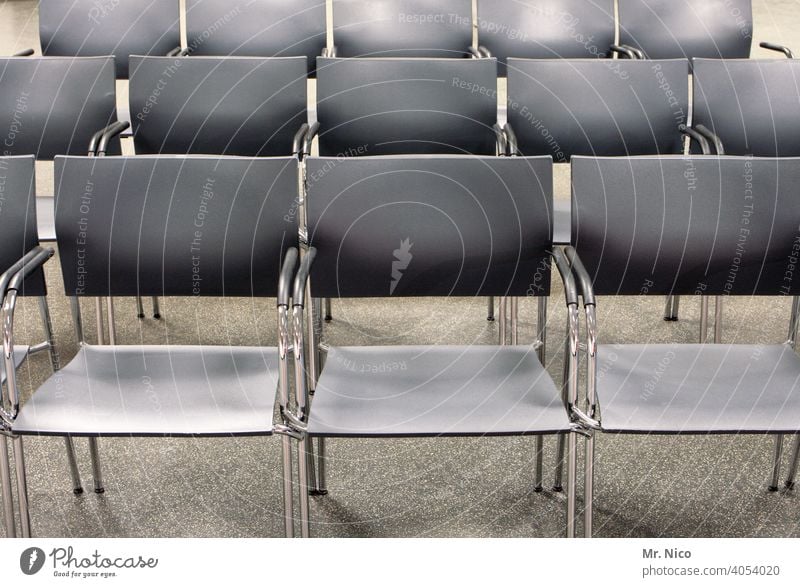 empty rows of chairs Chair Sit Row of chairs Seating Row of seats Empty Free Seating capacity Places Event Audience Structures and shapes Concert Hall Gray