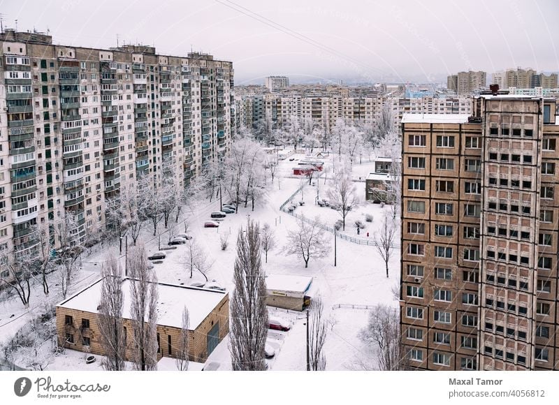High residential buildings covered by snow in winter Europe Kiev Minska Obolon Ukraine aerial apartment architecture balcony center city city landscape