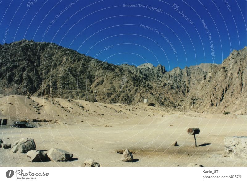 Mailbox in the desert Africa Egypt Hurgahada Vacation & Travel Loneliness Contentment Desert Sand Blue sky Stone Far-off places dead mailbox Red Sea