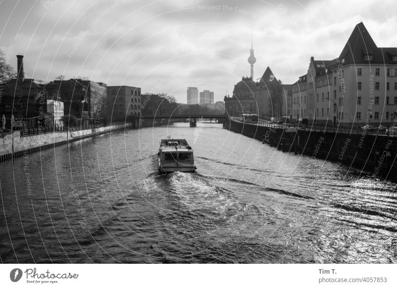 a passenger ship on the river Spree in the early morning in Berlin Television tower b/w in the morning Town Middle Capital city Downtown Exterior shot