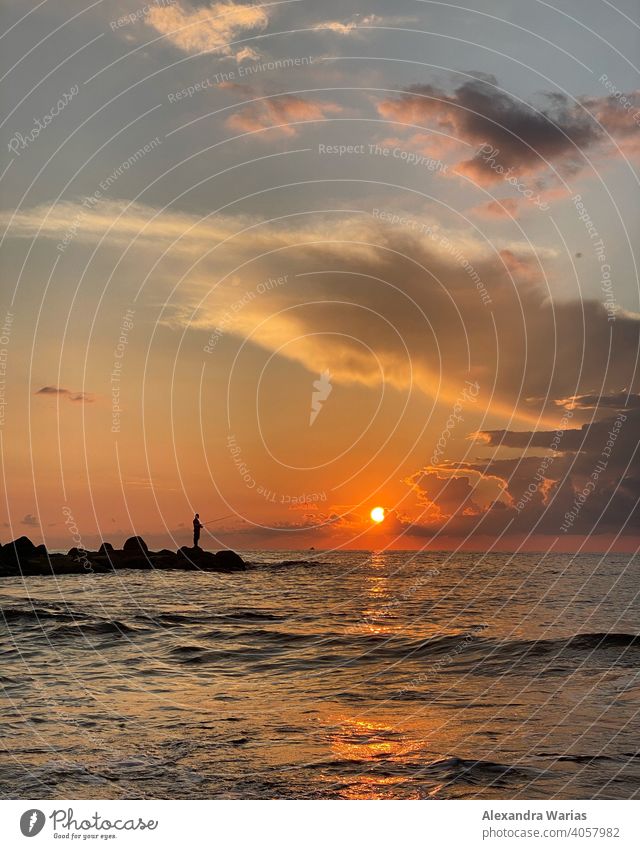 Fishermen at the sea at sunset Fisherman Angler Ocean Sunset Sunset sky sunset mood Sunset Landscape Sunset light Sunset colours Cyprus Europe