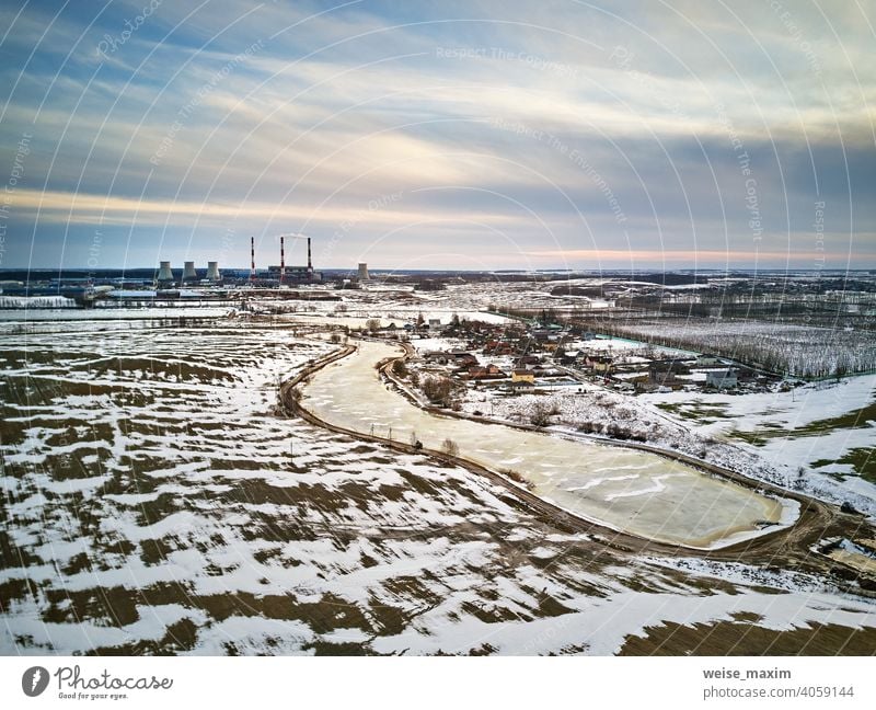Snow melting, Season change. Gas power plant near big city Minsk, Belarus. industry factory environment pollution aerial smoke electricity energy industrial