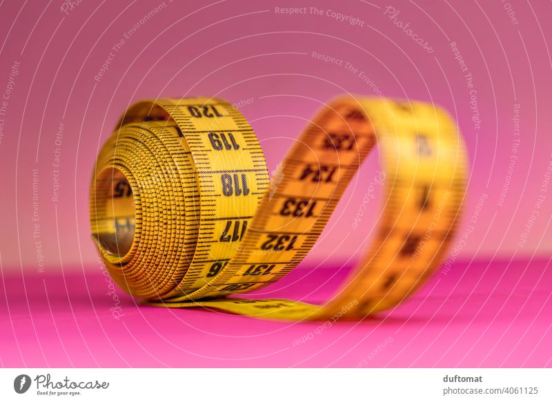 Pink measuring tape in centimeters isolated on white background Stock Photo  - Alamy
