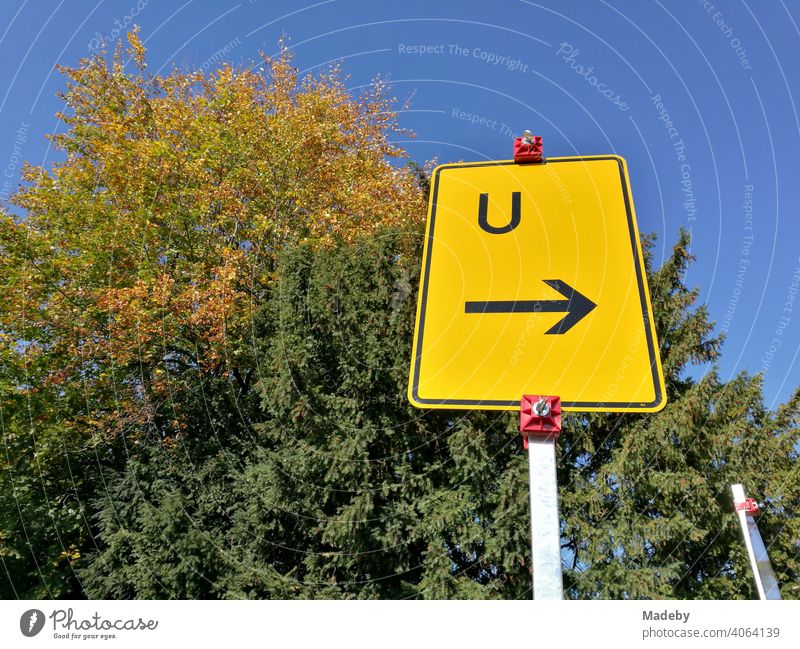 Passage forbidden with round traffic sign in front of blue sky in