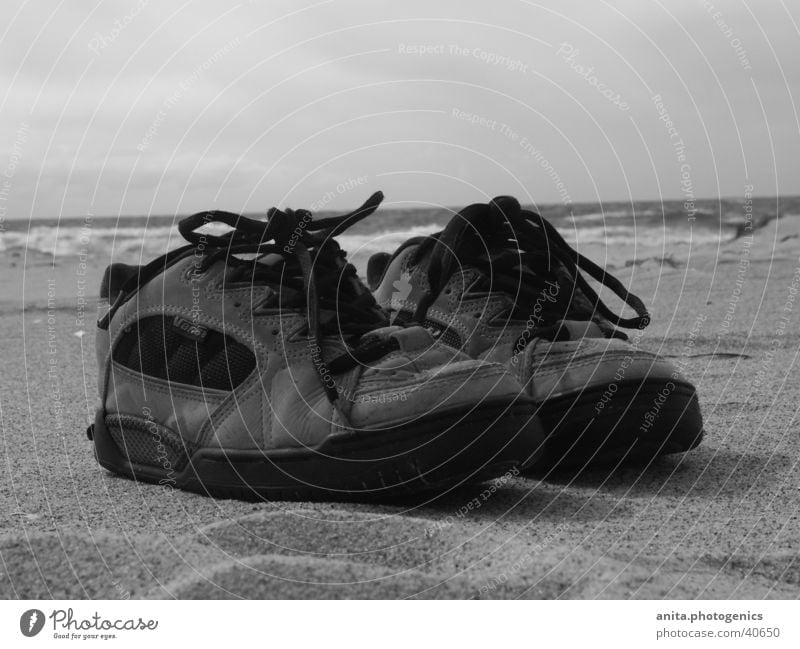 Shoes take a break Footwear Beach Ocean Vacation & Travel Leisure and hobbies Sand Black & white photo